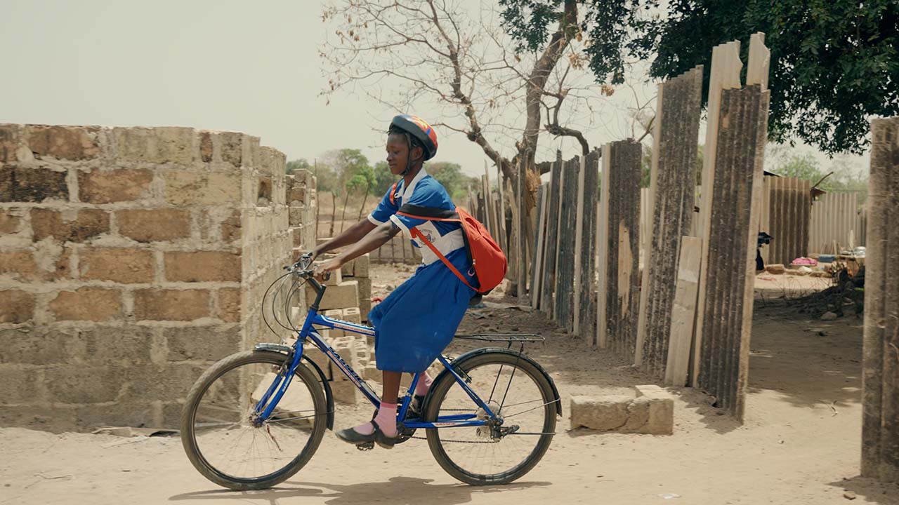 Student Riding Bicycle