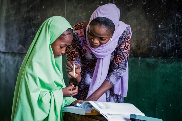 IRC facilitator Fatima teaching OOSC in Nigeria